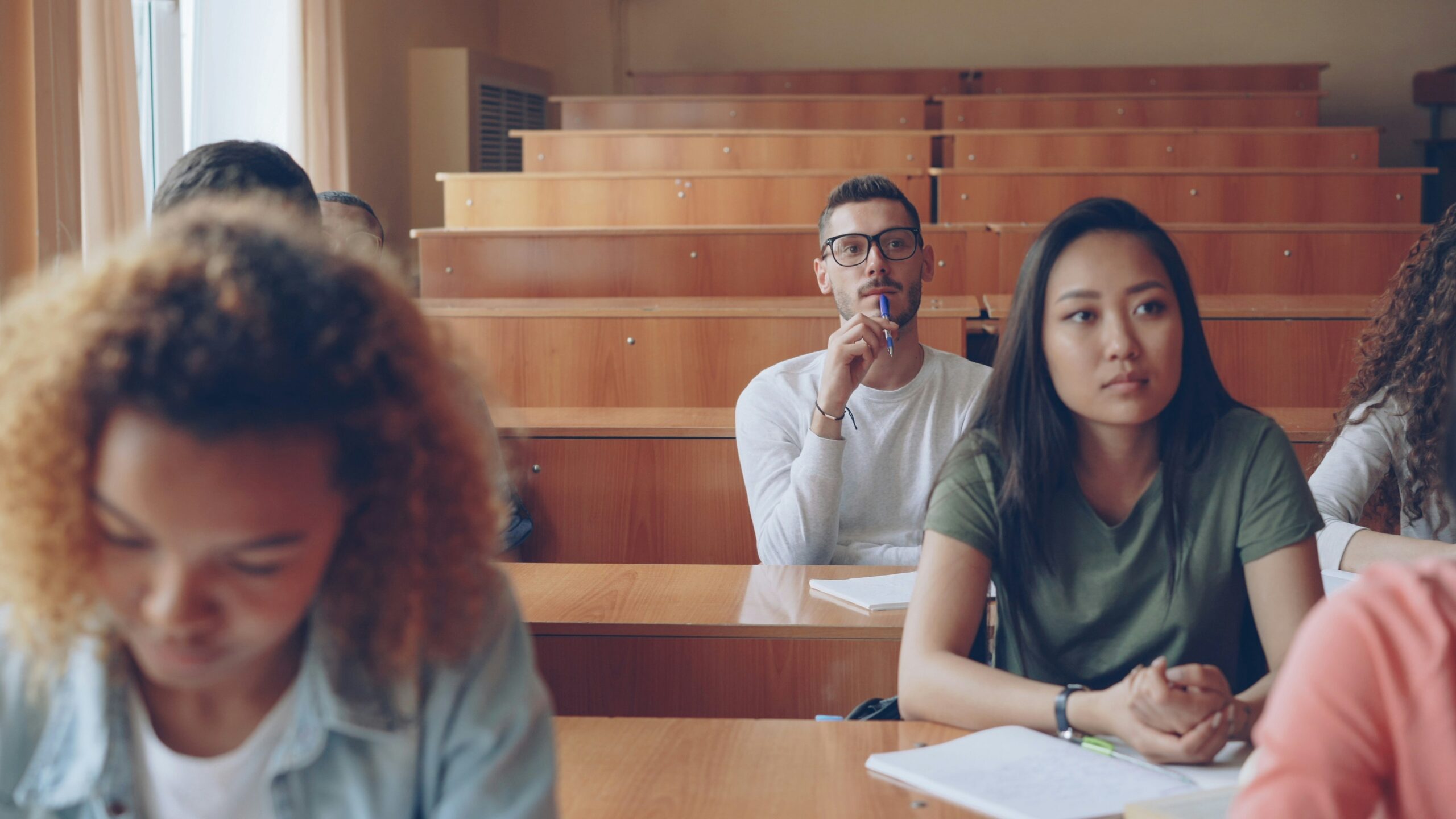 Students seated in a college classroom.